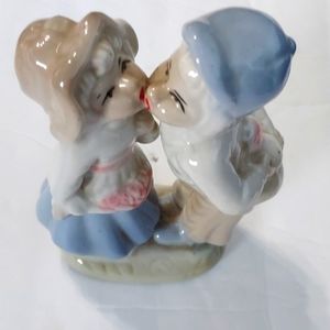 Cute Couple Kissing over 5 inches tall 3in.Wide.